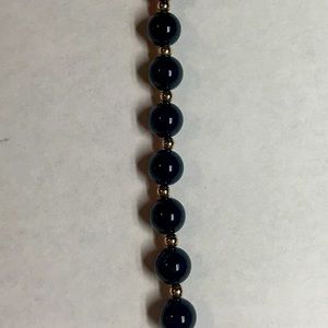Black onyx and 14 kit yellow gold bead bracelet